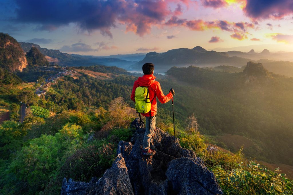 backpacker-standing-sunrise-viewpoint